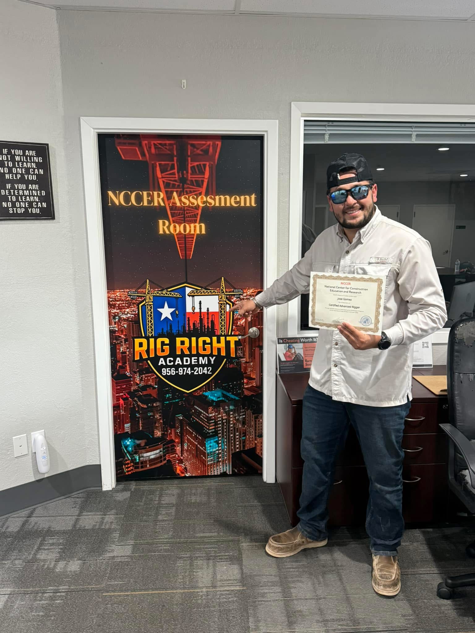 NCCER Advanced Rigger graduate holding his credential