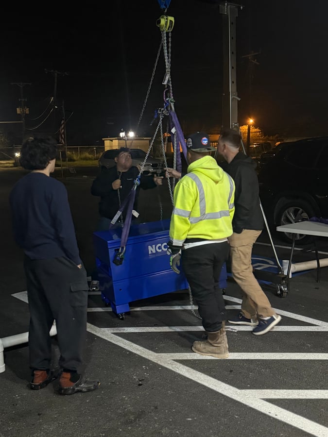 Mike Sanchez guiding students during hands-on rigging training