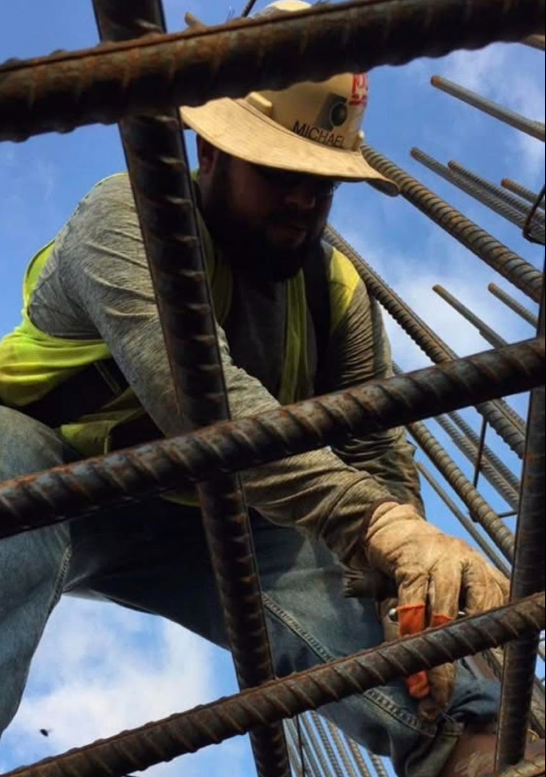 Mike Sanchez working in the field during his industrial career